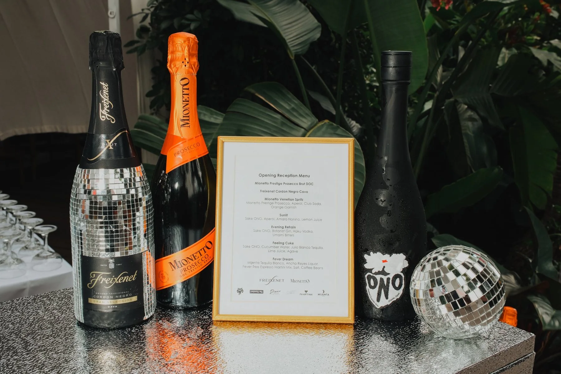 Opening reception bar: disco-ball Freixenet, Mionetto prosecco, Sake ONO and the cocktail menu