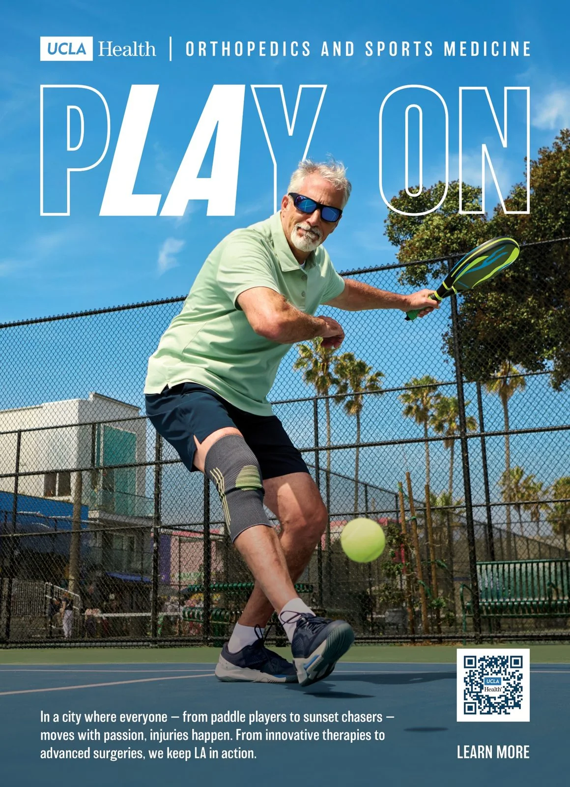 Print ad: a silver-haired pickleball player in a knee brace lunging for a shot under the words Play On